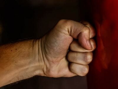 Man's fist hits wall | Domestic violence resources